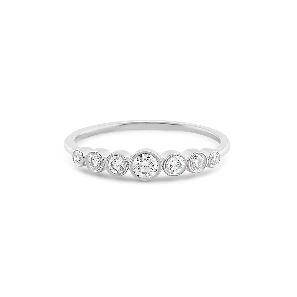 Graduated Seven Diamond Bezel Ring White Gold
